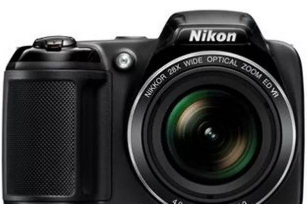 Nikon's profit falls by half as it admits demand is waning